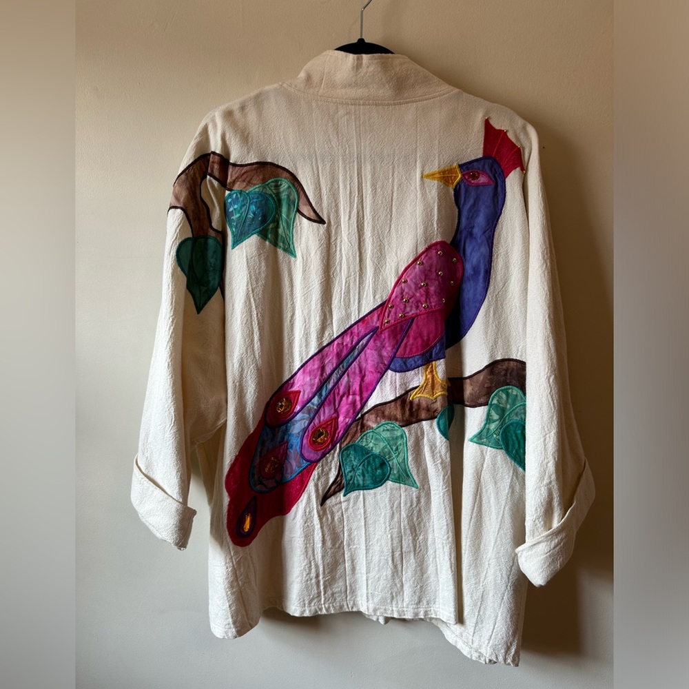 Cream Blazer with Vibrant Peacock Design